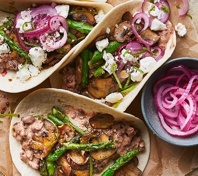 Vegetable tacos with quick-pickled onion, black beans & feta