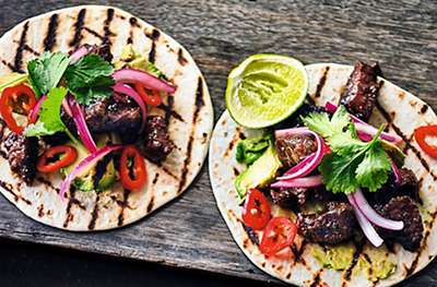 Guinness-braised beef tacos with pink pickled onions