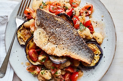 Sea bass with tomato & butter bean ragout