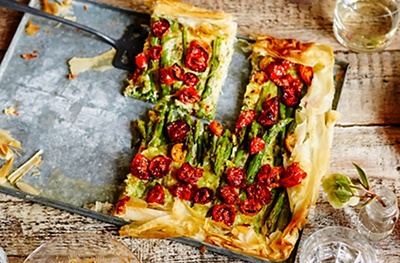 Anna Jones' sticky roasted tomato, rosemary and asparagus tart with tomato dressing