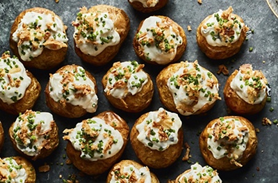 Baby jacket spuds with blue cheese & crispy onions