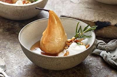 Baked honey pears with rosemary & pine nuts