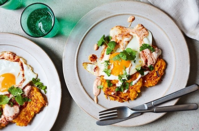 Carrot fritters with fried eggs & harissa yogurt
