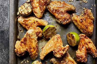 Chicken wings with sweet soy and burnt lime butter