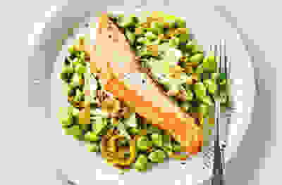 Fennel roasted salmon with spicy broad beans