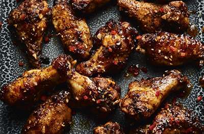 Gloriously sticky chicken wings are the ultimate party pleaser. Just make sure you have napkins to hand!