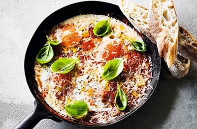 Italian-style baked eggs with basil & Parmesan