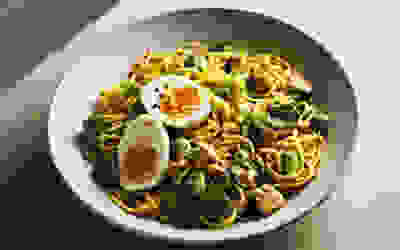 Miso butter noodles with crispy sprouts