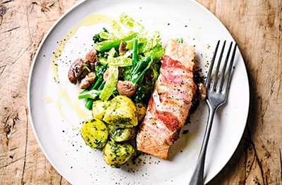 Pancetta salmon with creamed vegetables
