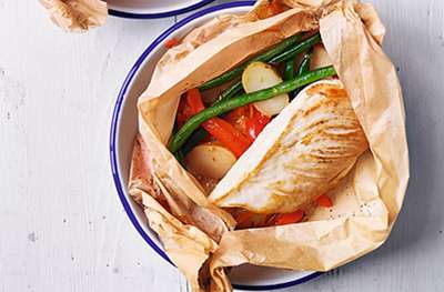 Parchment baked chicken with vegetables