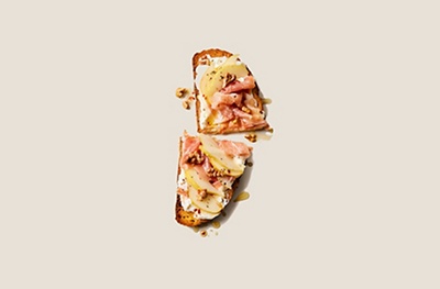Pear & prosciutto toast with hot honey