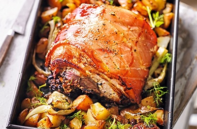 Porchetta-style pork belly with garlic roasties