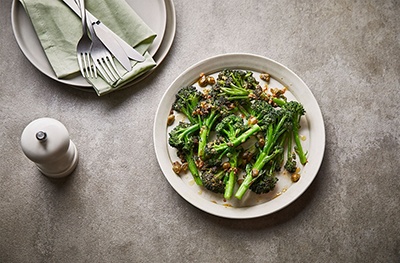 Purple sprouting broccoli with anchovy, garlic & capers