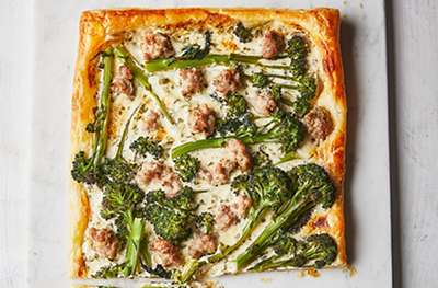 Purple sprouting broccoli & sausage puff pastry tart