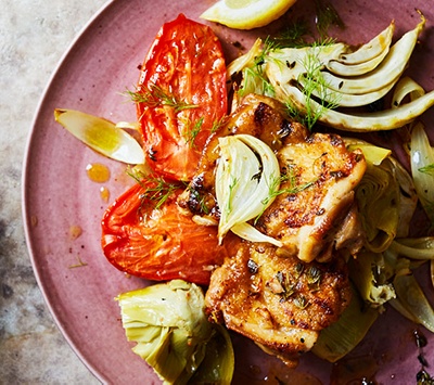 Griddled chicken with baked artichoke hearts, fennel & tomatoes