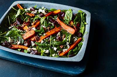 Roasted carrots with spinach, pecans and dates
