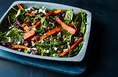 Roasted carrots with spinach, pecans and dates