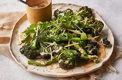 Roasted purple sprouting broccoli with ginger tahini dressing