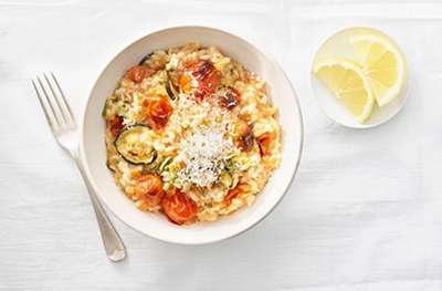 Roasted tomato risotto with courgette and lemon