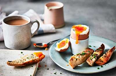 Soft egg with anchovy toasts