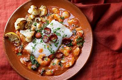 Spanish-style beans with cod and prawns