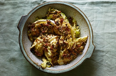Spiced roast cabbage with caper & raisin dressing