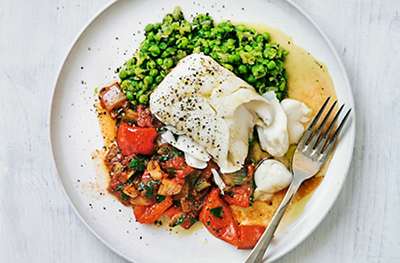 Tomato baked cod with mushy peas