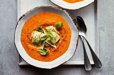 Vegan tomato soup with spinach ravioli