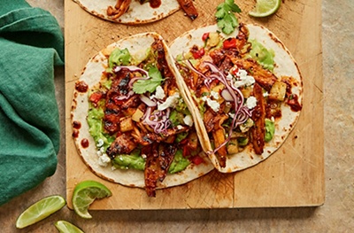 Ancho chilli & maple king oyster mushroom tacos with charred pineapple slaw