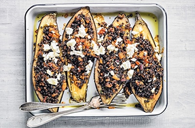 Aubergines stuffed with red chilli pesto & lentils