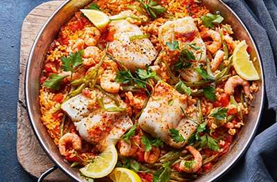 Baked Spanish-style rice with cod & prawns