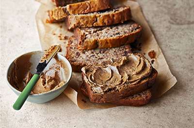Banana loaf with fruit, nuts, chocolate & espresso butter