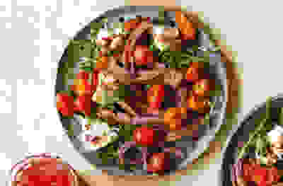 Beef tagliata, flame-roasted tomato & mozzarella salad
