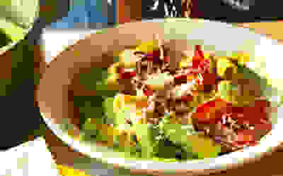 Super greens pasta with crispy bresaola