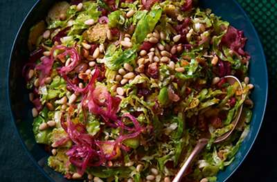 Brussels sprouts with red onion, pancetta & pine nuts