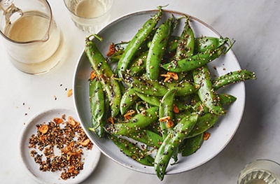 Chargrilled whole peas with sesame chilli sprinkle