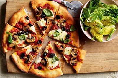 Cheat’s pizzas with mushrooms & black olives
