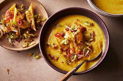 Curried leek, potato & celeriac soup with crunchy toppings
