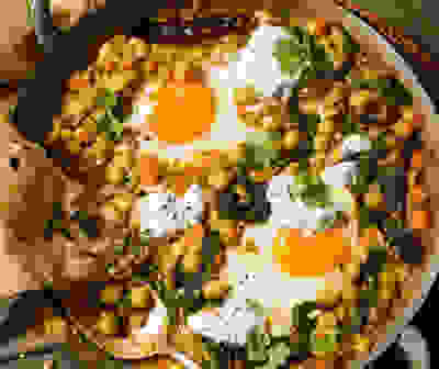 Dal baked eggs with herby yogurt & naan