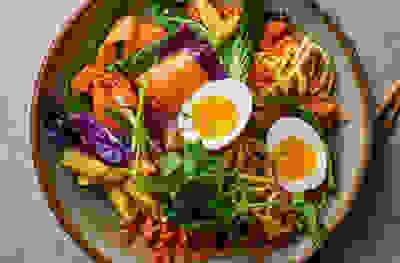 Fiery kimchi noodle stir fry with soft-boiled eggs