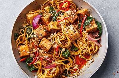 Firecracker tofu noodles with kale & peanuts