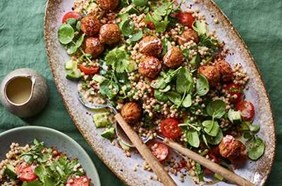 Giant couscous & falafel salad with sweet tahini dressing