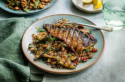 Griddled mackerel with herby courgette, grain & toasted seed salad
