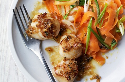 Scallops with ginger-spiced lemon butter and pickled carrots