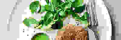 image of watercress with a burger on a plate