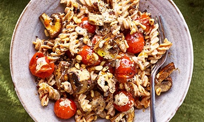 Red lentil pasta with cheesy cashew cream, balsamic roasted mushrooms & cherry tomatoes