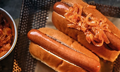 Hot dogs with New York-style pushcart onions
