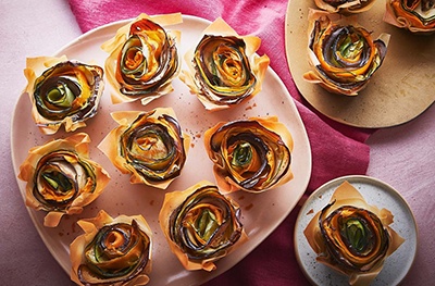 Filo tarts with roasted vegetables, maple syrup, herbs and nuts