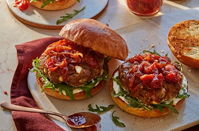 Seasoned with salty feta and covered in sticky, sweet relish, these burgers from Martha Collison are perfect for serving on Father’s Day