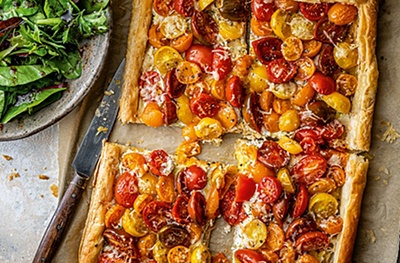 Mixed tomato & cheese tart,  with parsley salad